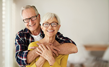 Photo of a man and woman smiling. Link to Life Stage Gift Planner Ages 60-70 Situations. Photo of a man and woman smiling. Link to Life Stage Gift Planner Ages 60-70 Situations.